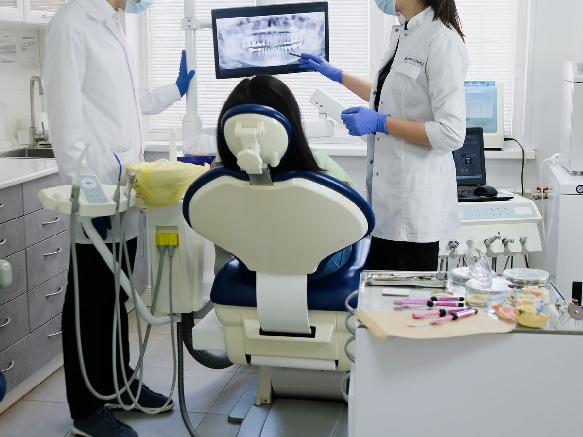 A dentist building trust with a patient